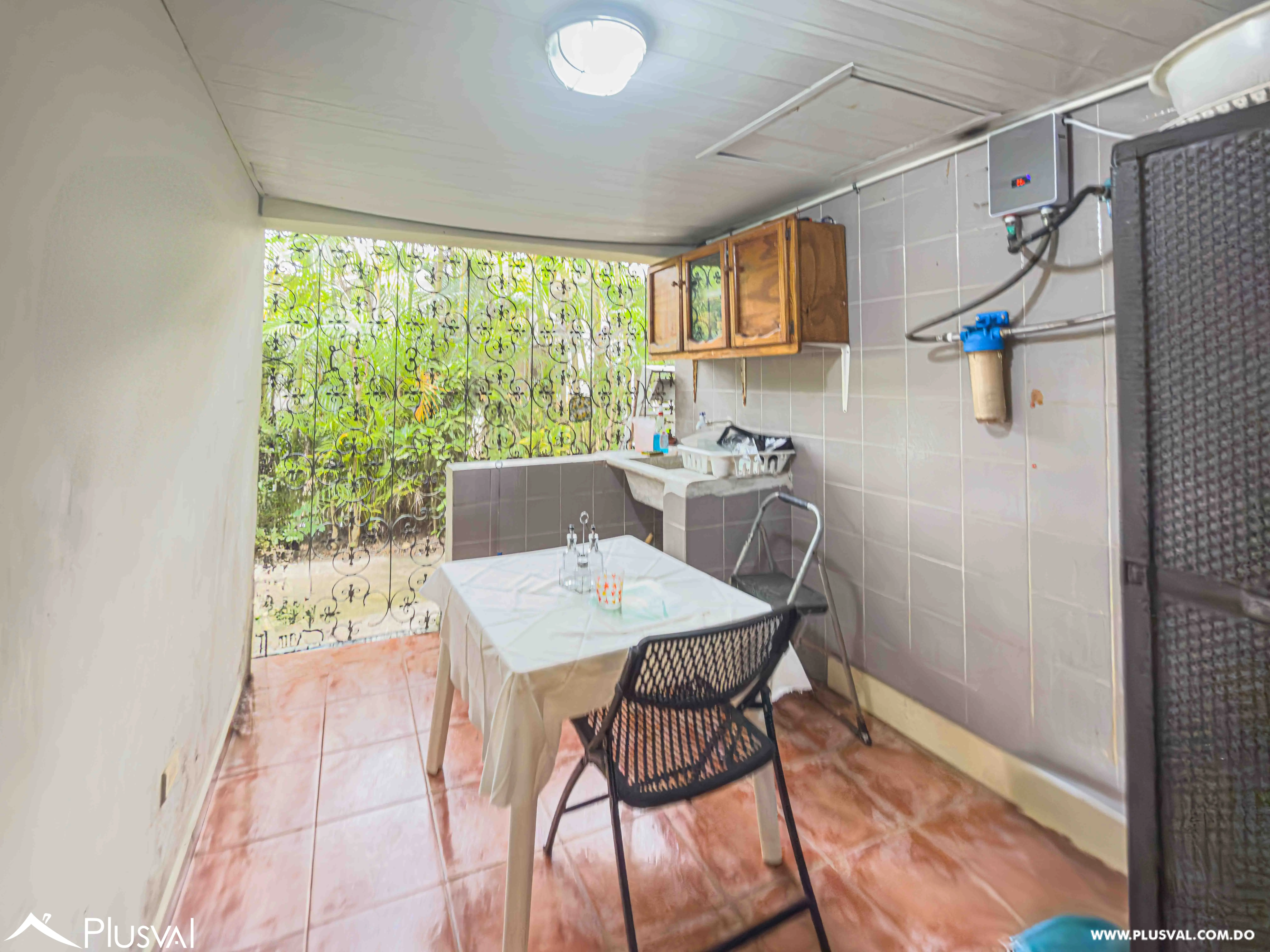 Villa en Venta en Juan Dolio con Piscina, Gazebo y Amplio Patio en Comunidad de Golf 496588